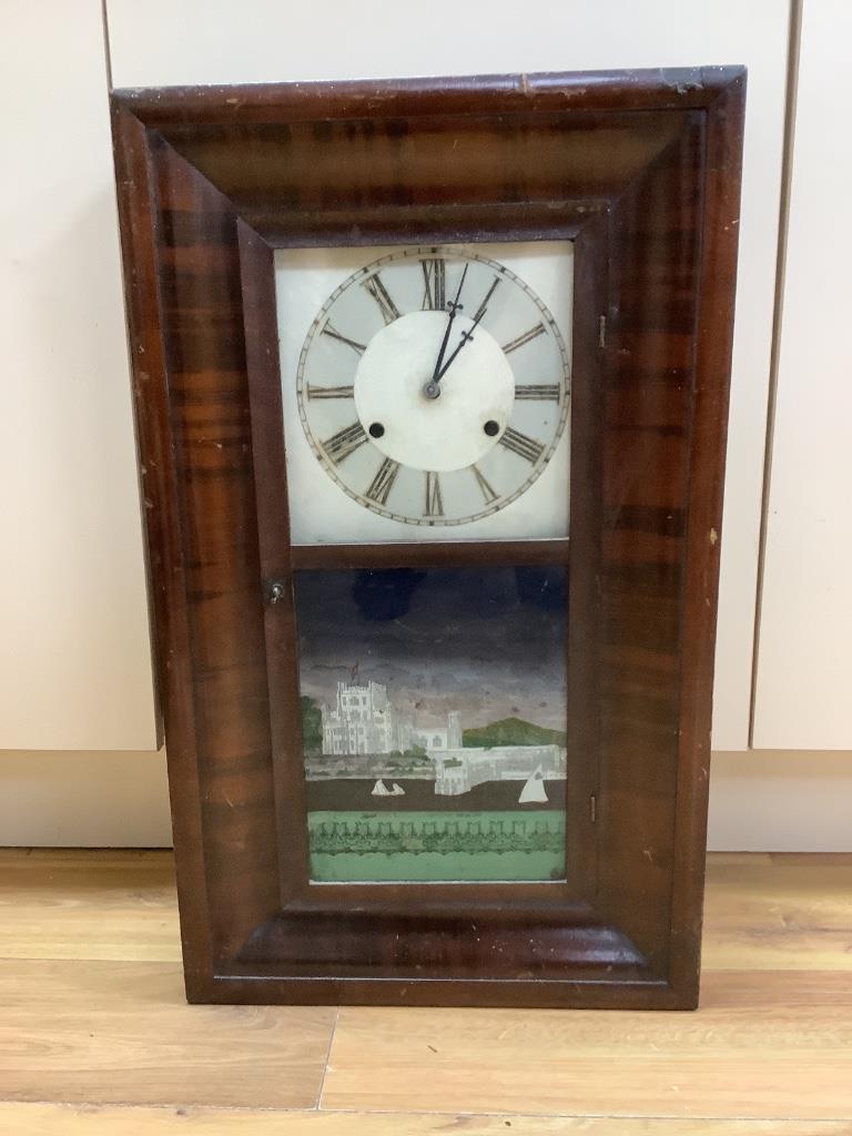 An American wall clock, by Jerome & Co, height 66cm